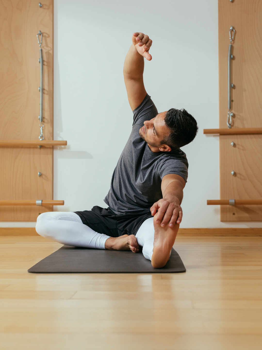 Private student practicing yoga in  his home